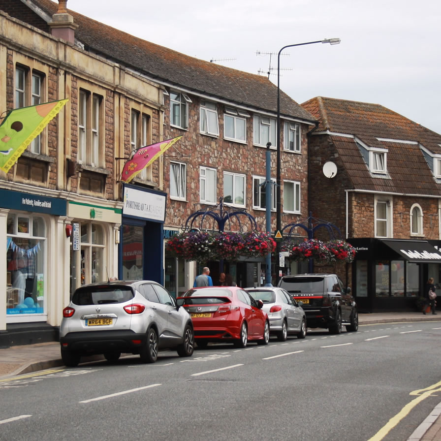 view of portishead high street with several shops